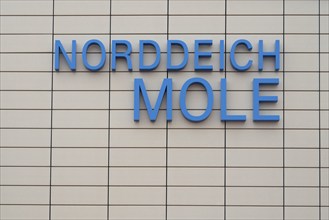 Wall with writing Norddeich Mole, Norddeich, East Frisia, Lower Saxony, Germany, Europe