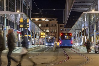 Central bus and tram stop. City centre in the evening. Chemnitz, Saxony, Germany, Europe