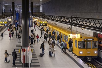 Berlin Central Station underground station. Platform with passengers on the U5 line to Hönow.