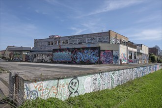 Graffiti on the building of an empty car dealership, Franconia, Bavaria, Germany, Europe