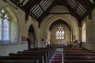 Nave chancel arch altar east window inside village parish church of Saint Mary, Boyton, Suffolk,