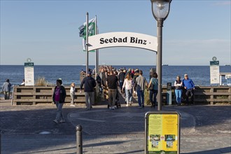 People walking on the pier in Binz in clear sky and sunny weather, Rügen, Binz