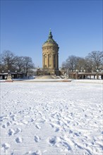 Historic water tower of Mannheim at Friedrichsplatz in winter, snow, Baden-Württemberg, Germany,