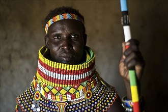 Portrait of a woman from the Turkana tribe, Kenya. She is adorned with traditional beadwork