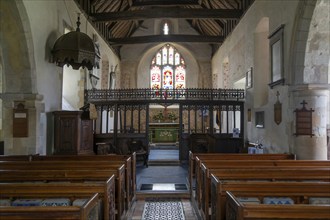 Interior of church of Saint Mary the Virgin, Silchester, Hampshire, England, UK view of nave, rood