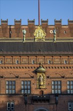 Brick façade with gilded sculpture of Bishop Absalon, Town Hall in the National Romantic style by