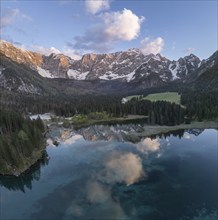 Aerial view of Lago Fusine with the Mangart massif in the background, Tarvisio, province of Udine,