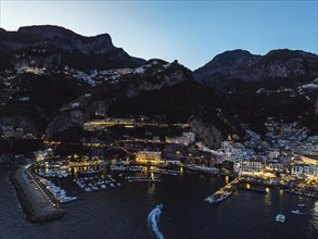 Amalfi at night from a drone, Salerno, Campania, Italy, Europe