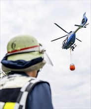 Forest fire fighting exercise of the Essen fire brigade, the water supply was rehearsed over longer