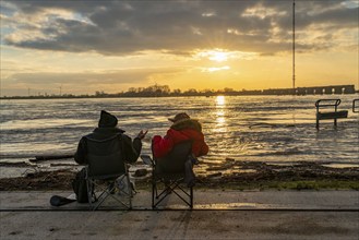 Rhine flood, riverside promenade in Wesel, partly the river water is already spilling onto the