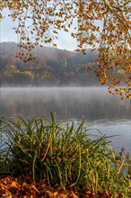 Headframe of the former Carl Funke colliery in Heisingen, autumn atmosphere at Lake Baldeney,