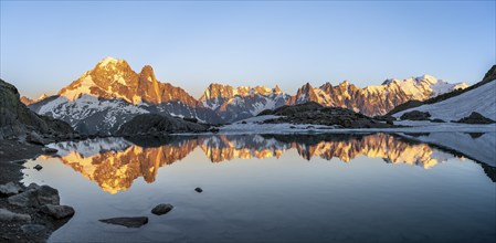 Evening mood, mountain landscape at sunset, alpenglow, water reflection in Lac Blanc, mountain