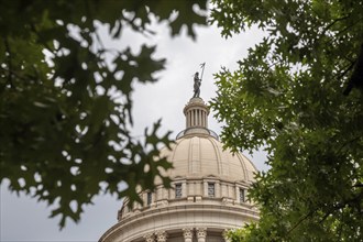 Oklahoma City, Oklahoma, The Oklahoma state capitol building. 'The Guardian, ' a bronze statue by