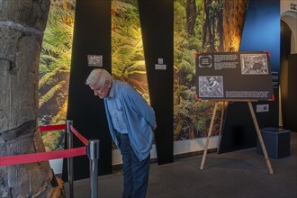 Elderly visitor in the be-MINE Mijnmuseum, coal mine museum in the city Beringen, Koersel, province