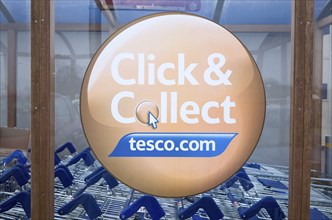 Click and Collect Tesco sign close up, UK