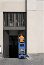 Construction worker with construction machine, Berlin, Germany, Europe