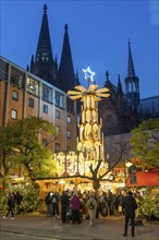 Christmas market, Am Hof, below Roncallli Platz, Christmas pyramid, right next to Cologne