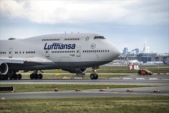 Lufthansa Boeing 747-400 takes off on the western runway at Frankfurt am Main Airport, FRA, Hesse,