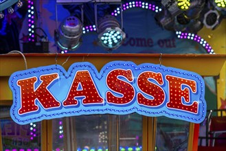 Funfair, fairground, illuminated sign for the cash desk of a fairground ride