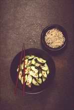 Chinese salad, cucumbers with chili pepper and sesame seeds, homemade, no people