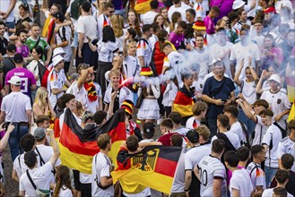 UEFA European Football Championship. Enthusiastic fans at the public viewing in the host city of