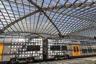 Local train and glass roof at Cologne Central Station, Cologne, Rhineland, North Rhine-Westphalia,