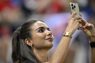 TV presenter Lea Wagner, takes selfie with smartphone, portrait, smiles, Voith-Arena, Heidenheim,