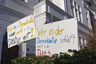 Banner, Those who sleep in democracy wake up in dictatorship, demonstration against right-wing