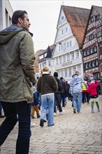 Moving crowd of demonstrators in a city street, Against the Right Demo, Nagold, Black Forest,