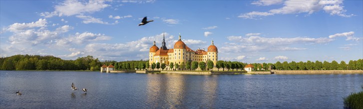 The moated castle, also known as a film set, lies in the middle of a lake and is a popular