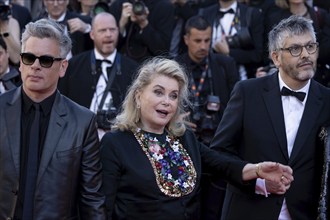 Cannes, France, 21 May 2024: Benjamin Biolay, Catherine Deneuve and Christophe Honore at the