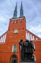 Sculpture group St Sigfrid and his three nephews by Peter Lime tree in front of Växjö Cathedral,