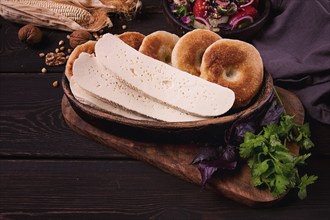 Mchadi, corn tortillas, traditional Georgian dish, corn bread, with Imeretian cheese, homemade, no