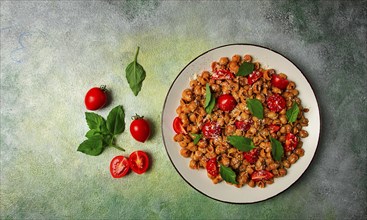 Tuscan pasta with smoked paprika and basil, parmesan cheese, Italian traditional cuisine