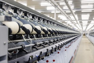 BENIN TEXTILE CORPORATION BENIN, Spun yarn is assembled on reels in a textile factory near Cotonou