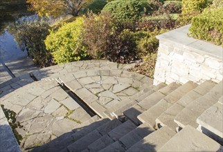 Cottage garden with stone stairs and retaining wall, Modern landscape design