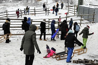 The first snow is here. Despite the coronavirus pandemic, families with children are enjoying