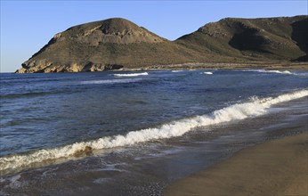 Beach and waves at Playa de Playazo, Rodalquilar, Cabo de Gata natural park, Almeria, Spain, Europe