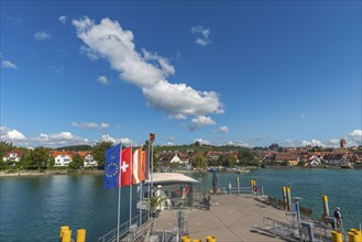 Townscape, jetty, flags, blue sky, Hagnau on Lake Constance, Baden-Württemberg, Germany, Europe