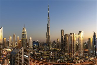 Burj Khalifa skyline tallest building in the world from above in Downtown at night in Dubai, United