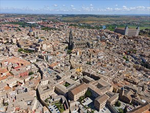 Close-up of the city centre with historic architecture and sweeping views under a cloudy sky,