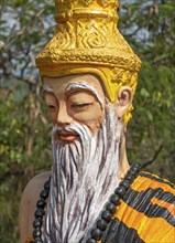 Deity statue, Phousi or Phu Si Hill, Luang Prabang, Laos, Asia