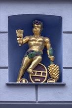 Bacchus figure in a niche of a residential building, Wismar, Mecklenberg-Western Pomerania,