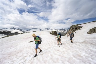 Three mountaineers crossing a snowfield, ascent to the Nördliche Mörchnerscharte, Berliner