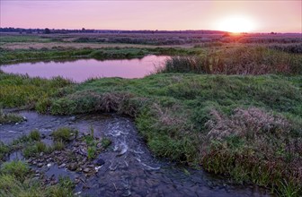 Sunrise over the meandering riverbed of the Narew and the Narew National Park, Narwianski Park