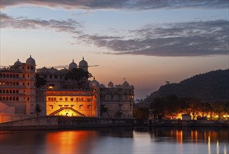 Illuminated city palace, Maharana or Maharaja of Udaipur, Lake Pichola, Udaipur, Rajasthan, India,