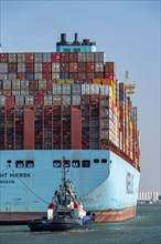 Container ship of the shipping company Maersk Line, Maastricht Maersk, leaving the harbour, towed