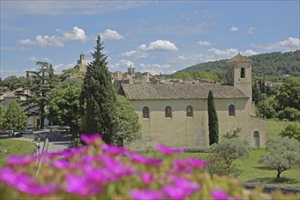 Temple, church, floral decoration and townscape of Lourmarin, Luberon, Vaucluse, Provence, France,