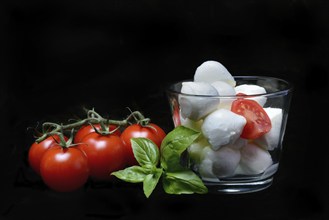 Cherry tomatoes and mozzarella cream cheese in a jar, cherry tomato