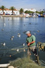 Fisherman at Gilao, Tavira, Algarve, Portugal, Europe